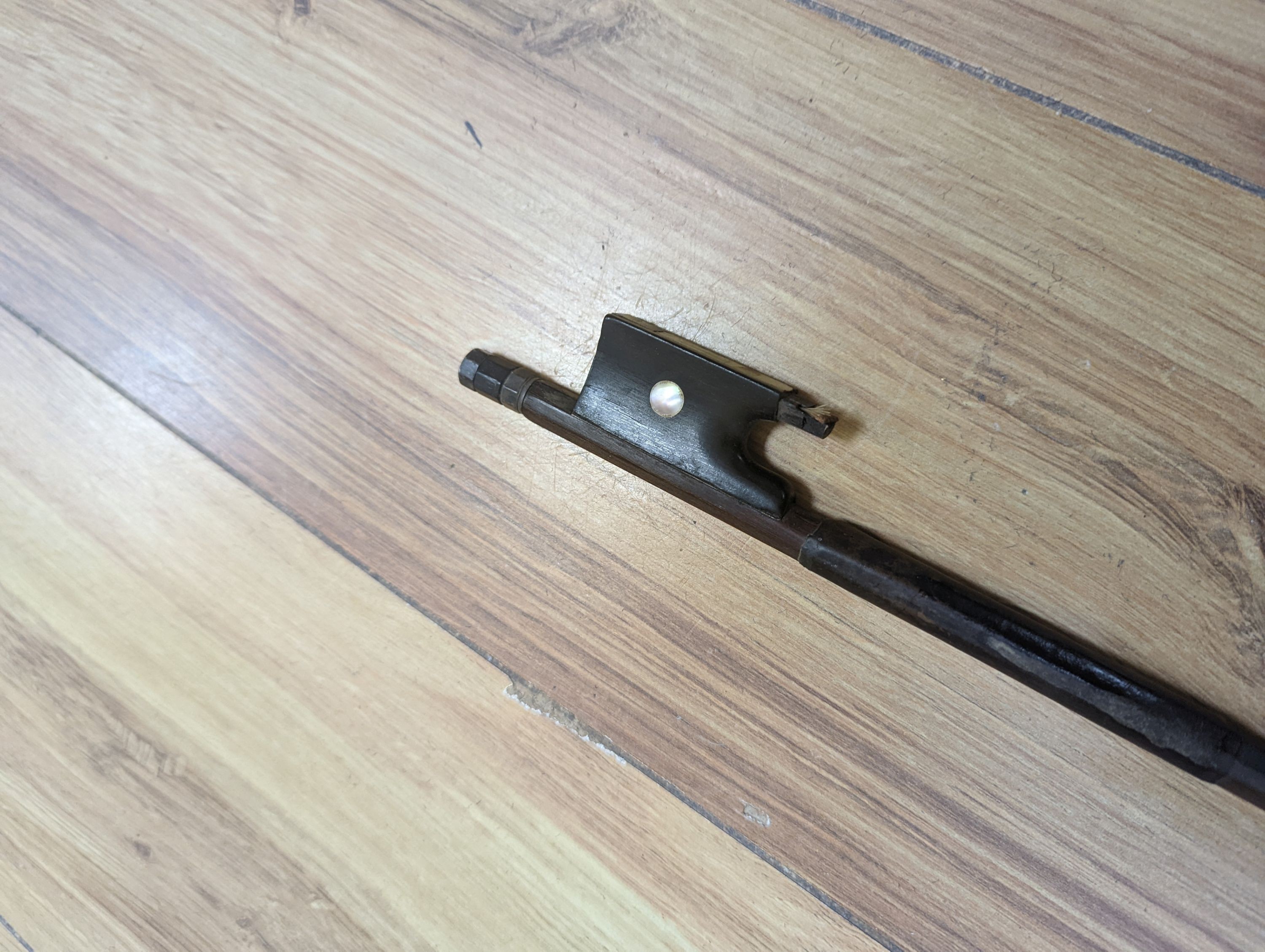 A violin and bow, various records etc